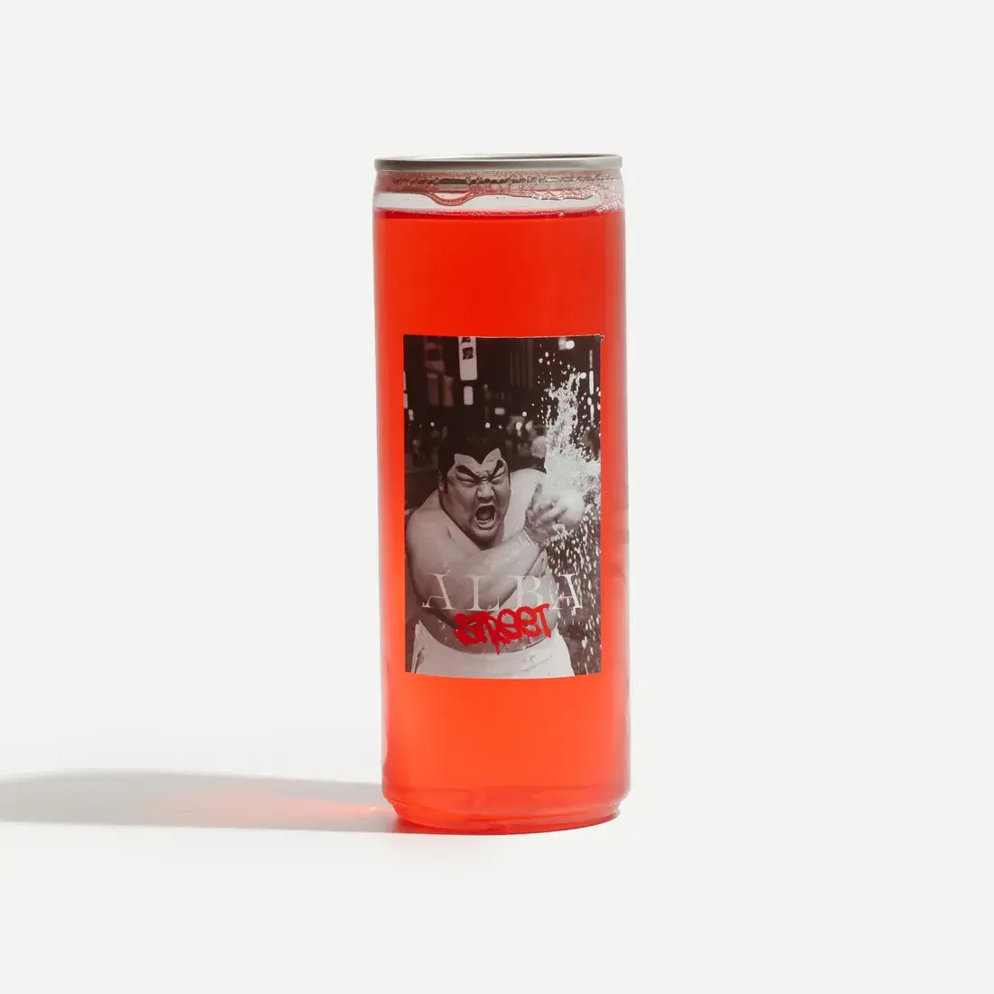 Cherry Almond Lemonade in a 330ml Alba Street can on a pale backdrop, the deep cherry-red drink visible through the glass