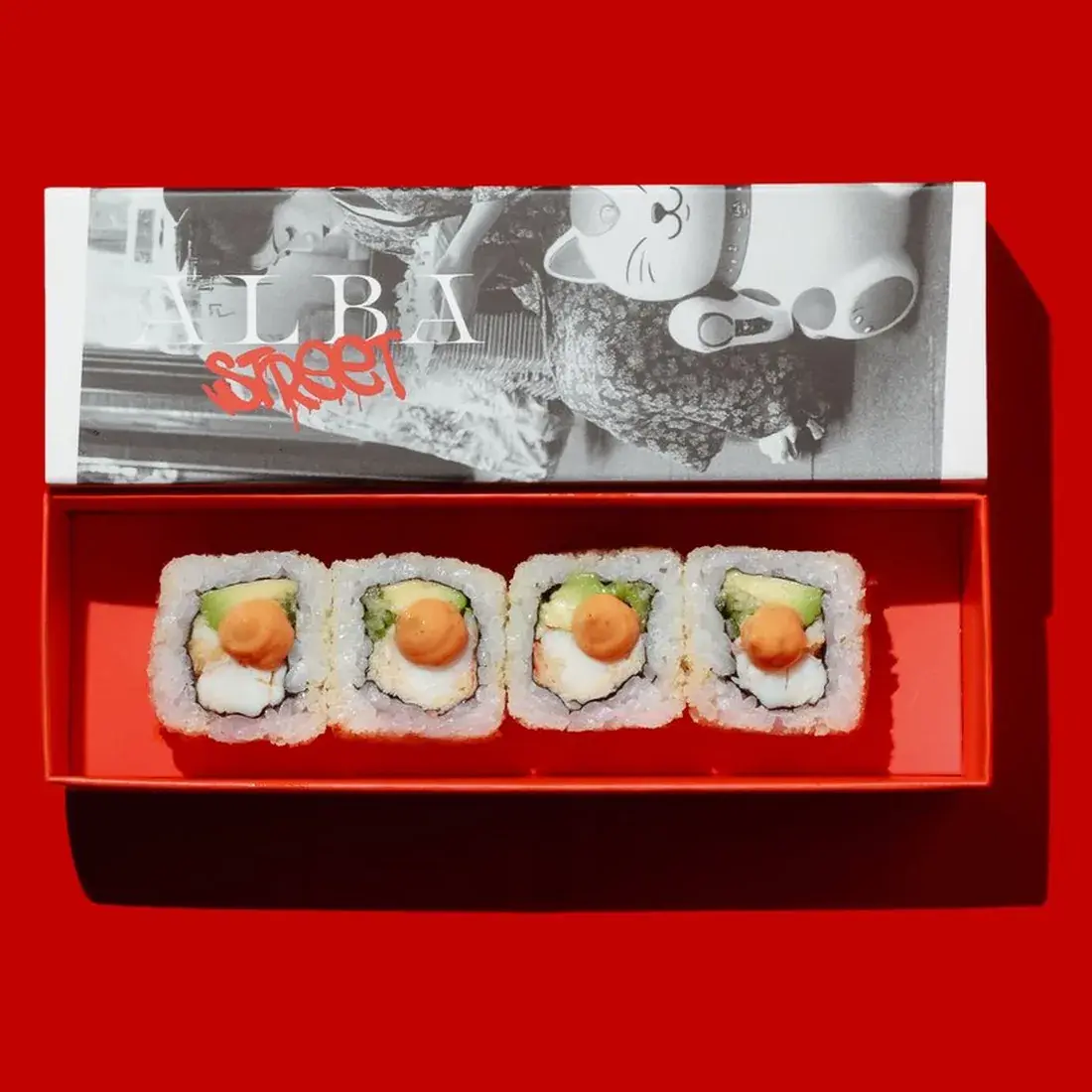 Crunchy California Maki Roll in an Alba Street presentation box against a red backdrop at Alba Street, Social Distrikt, Dubai Mall