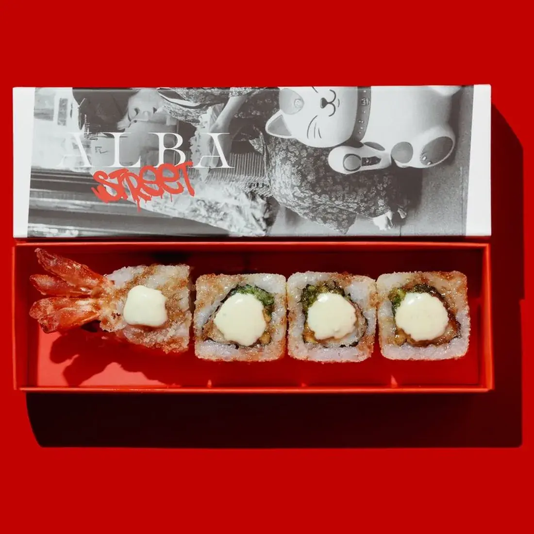 Crunchy Tempura Maki Roll in an Alba Street presentation box against a red backdrop at Alba Street, Social Distrikt, Dubai Mall