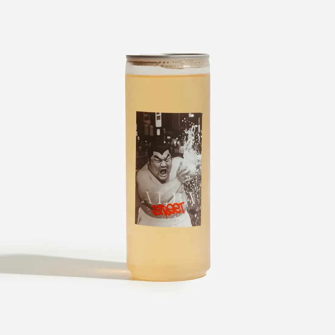 Milk Oolong Mango Lemonade in a 330ml Alba Street can on a pale backdrop, the golden mango drink visible through the glass