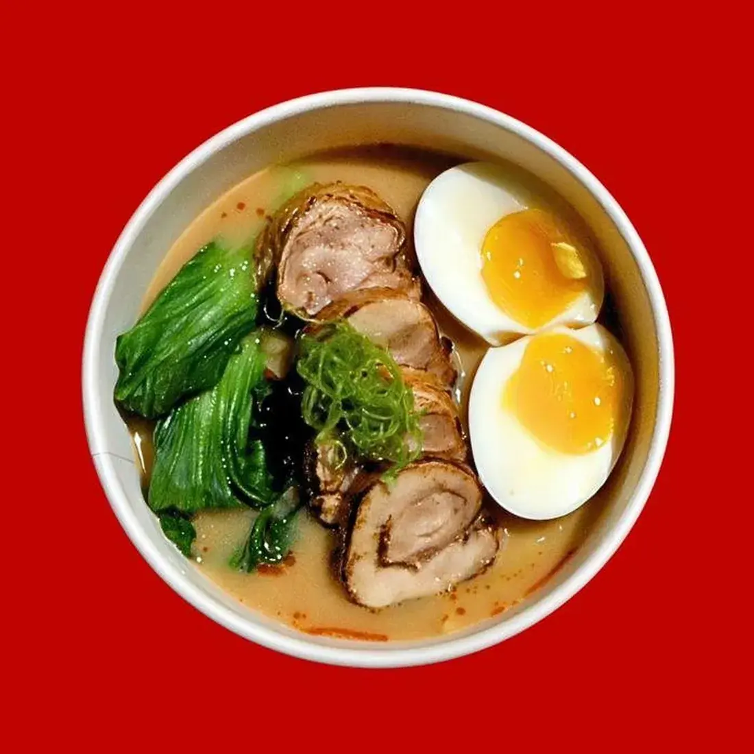 Miso Chicken Ramen in a bowl against a red backdrop at Alba Street, Social Distrikt, Dubai Mall