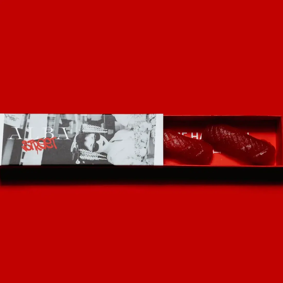 Tuna Akami Nigiri – 2 Pcs in an Alba Street presentation box against a red backdrop at Alba Street, Social Distrikt, Dubai Mall