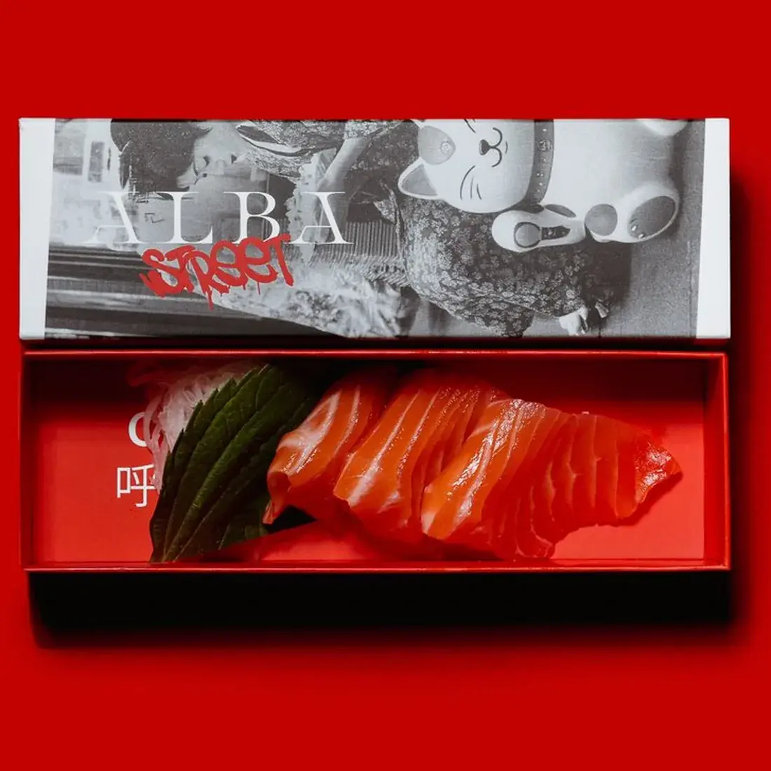 Salmon Sashimi – 3 Pcs in an Alba Street presentation box against a red backdrop at Alba Street, Social Distrikt, Dubai Mall