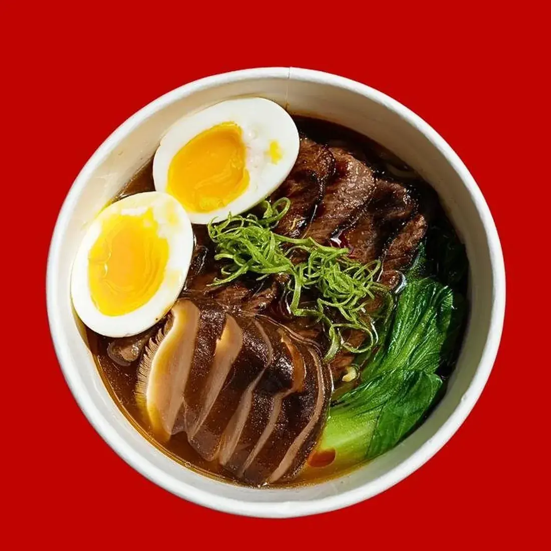 Wagyu Yakiniku Ramen in a bowl against a red backdrop at Alba Street, Social Distrikt, Dubai Mall